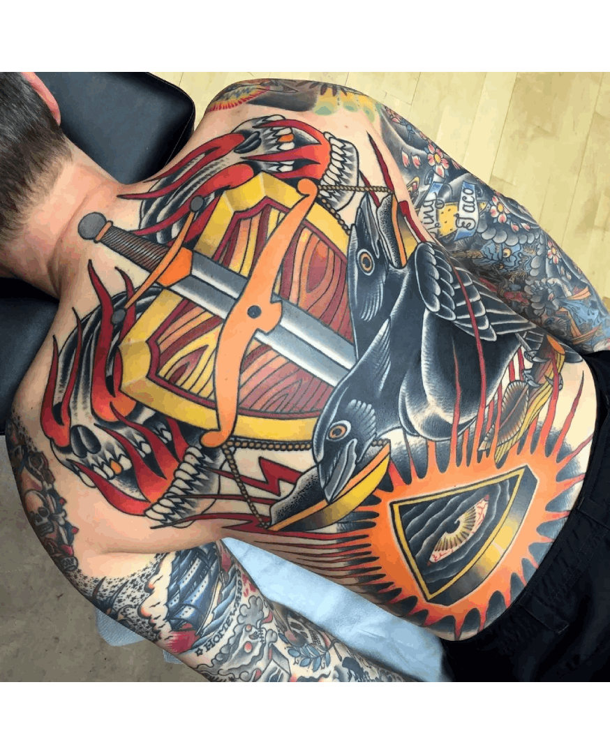 Large traditional backpiece tattoo made by Myke Chambers