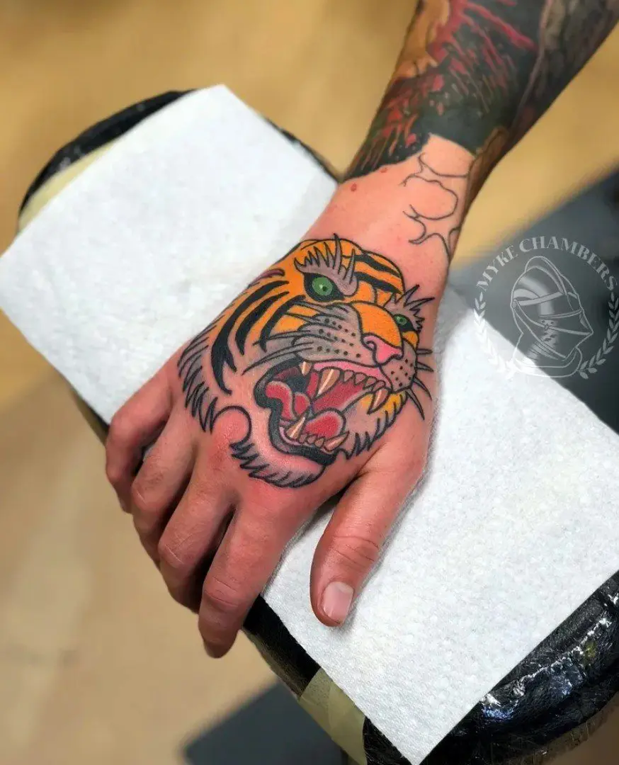 American traditional Tiger tattoo on hand