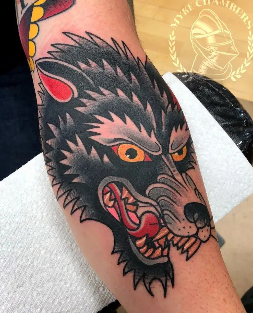 American Traditional wolf tattoo with Red eyes