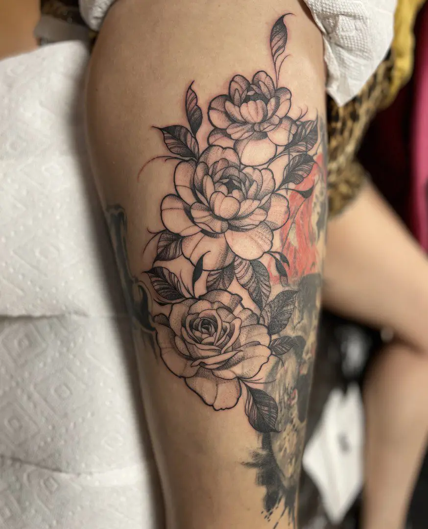 Fine line black and grey floral tattoo