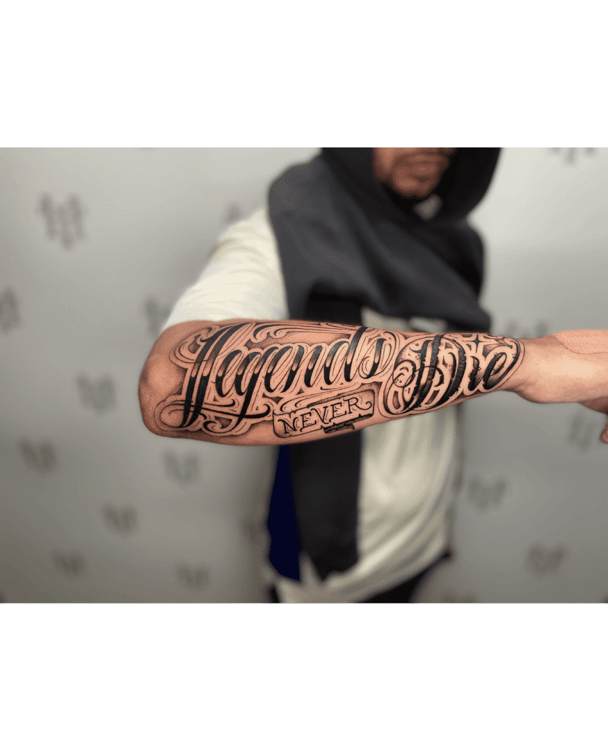 Lettering tattoos drawn on to fit