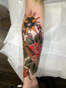 Flail tattoo, mace and roses. Best American Traditional Tattoo Artist- Myke Chambers