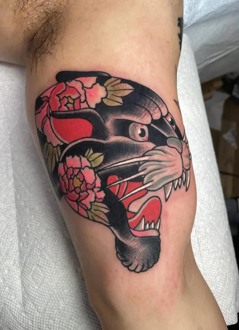 Floral Panther traditional tattoo