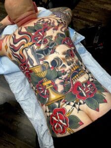 Full traditional back piece tattoo. rats get fat while good men die. Best American Traditional Tattoo Artist- Myke Chambers