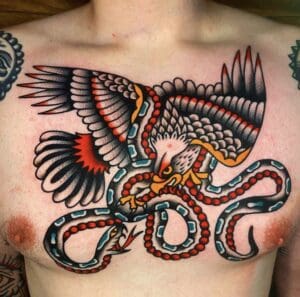 Traditional Tattoo chest piece snake and eagle fight