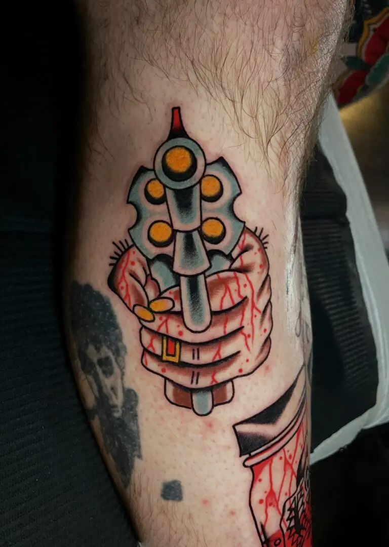 color traditional revolver tattoo