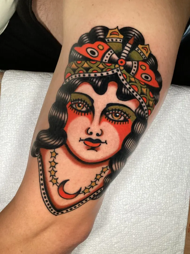 color tradtional tattoo of a lady head