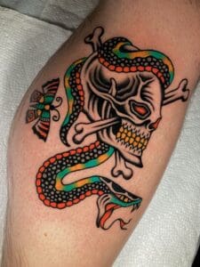 american tradtional skull and snake tattoo
