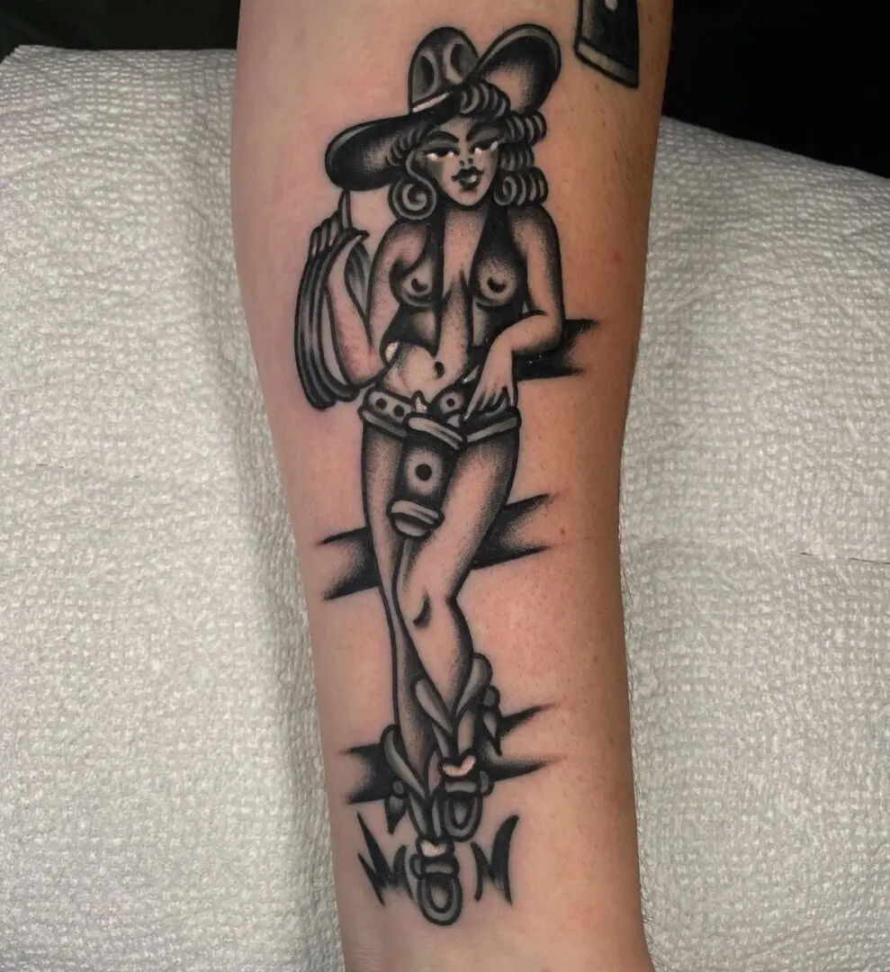 Black and grey traditional lady tattoo