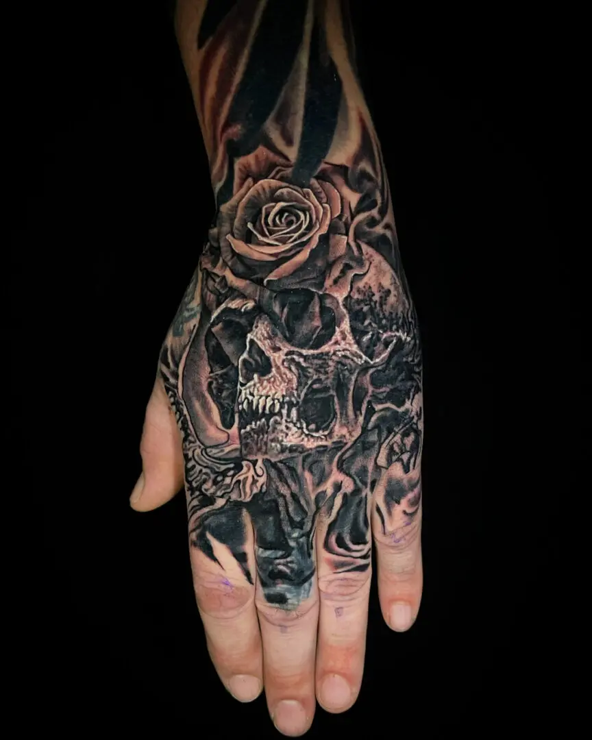 realistic skull tattoo on hand