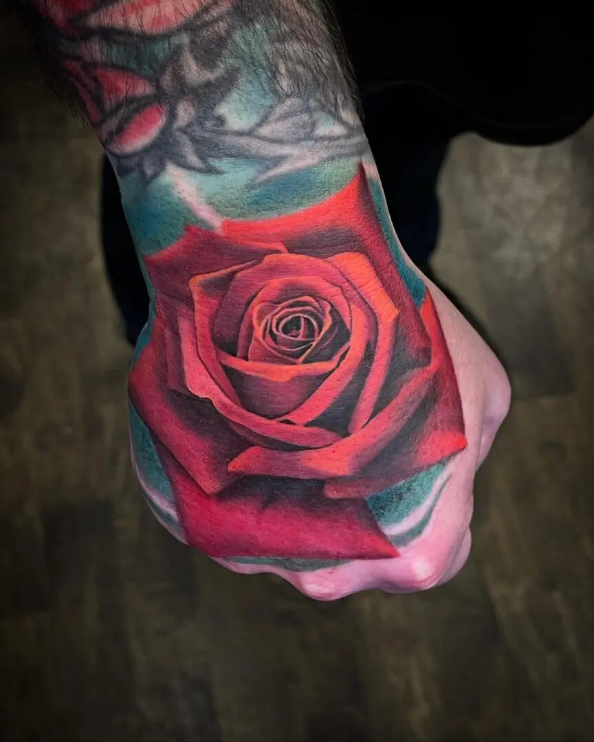 color realism rose on a hand