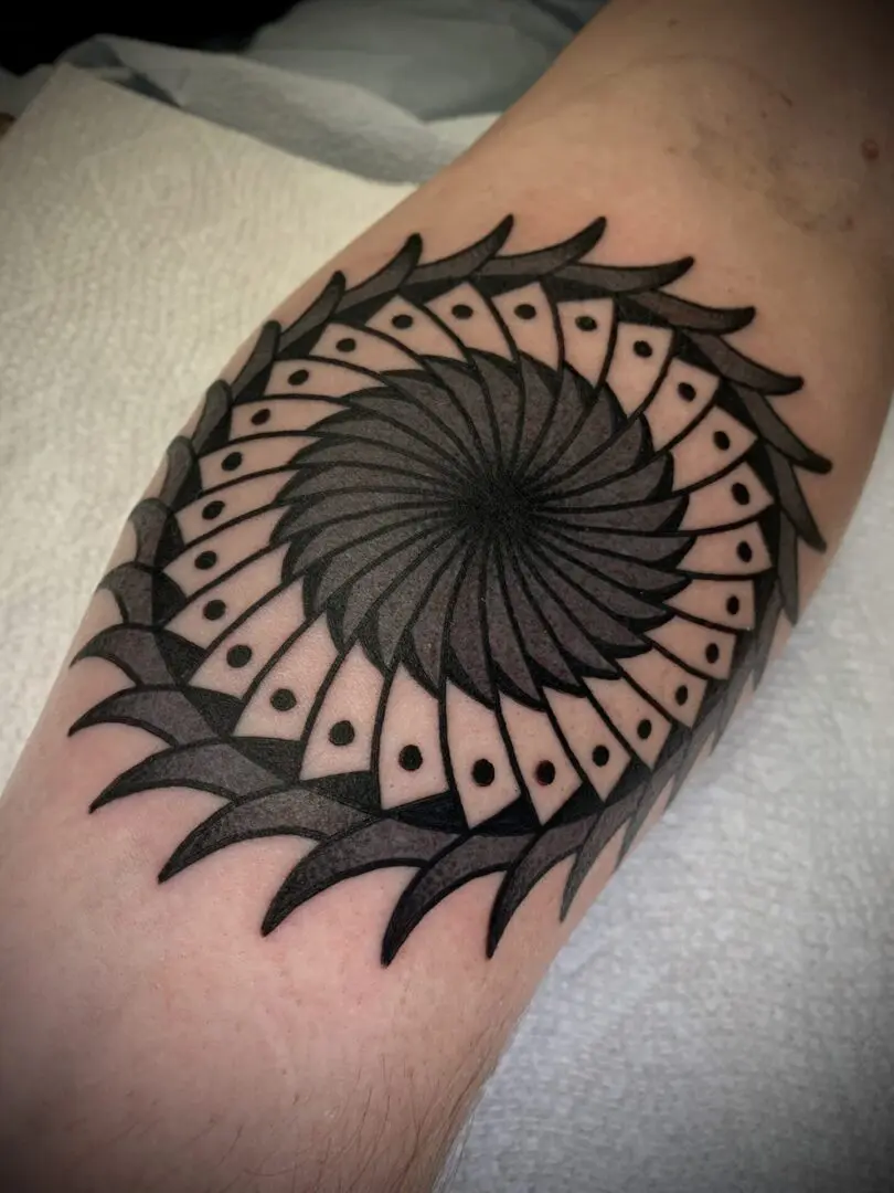 geometric black and grey tribal tattoo