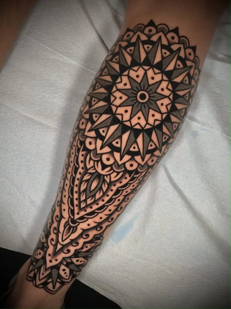 Geometric black and grey tattoo